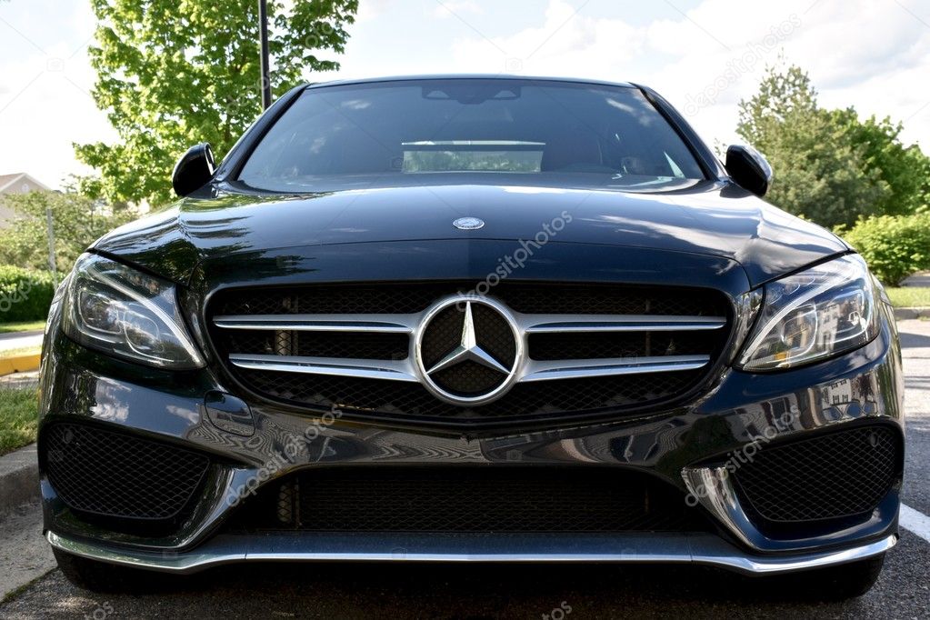 MARYLAND, USA - MAY 7, 2016: A black Mercedes Benz C400. Mercedes Benz is a luxury car dealer and manufacturer.