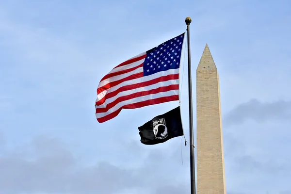 USA flag next to POW MIA flag with Washington monument in the background — Stock Photo, Image