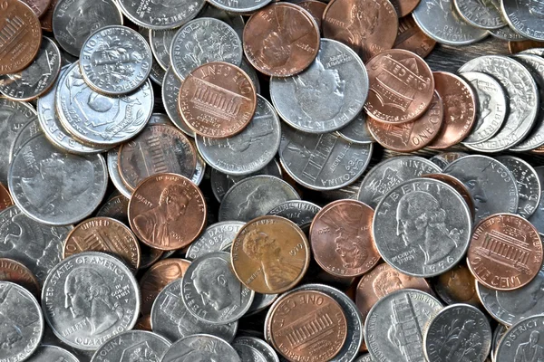 Coins laying in a pile — Stock Photo, Image