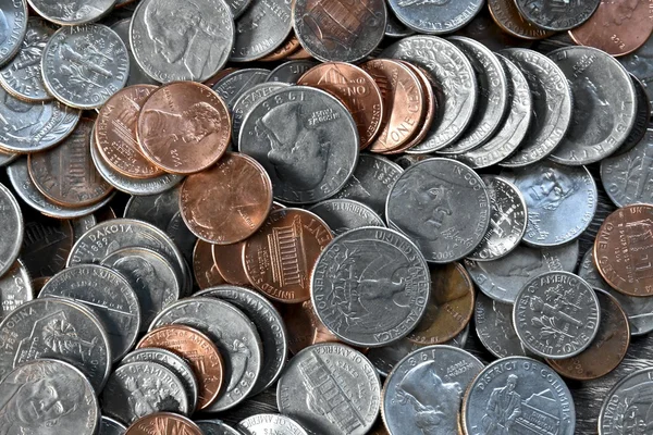 Coins laying in a pile — Stock Photo, Image