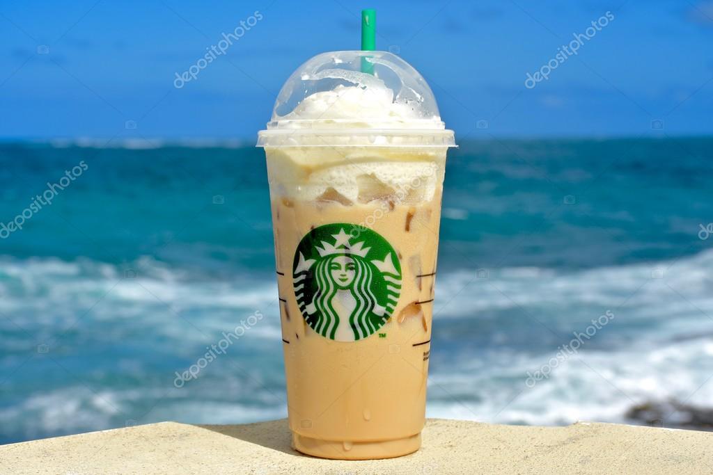 CONDADO, PUERTO RICO - JANUARY 24, 2016: A Starbucks coffee on the beach in Condado, Puerto Rico. Starbucks Corporation is an American coffee company and coffeehouse chain.