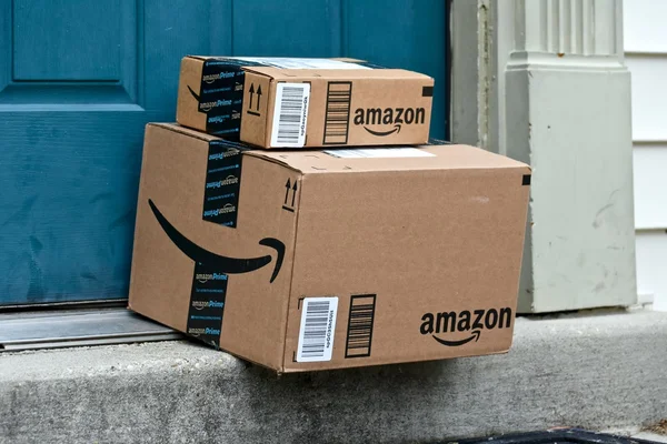 Amazon boxes delivered to a home — Stock Photo, Image