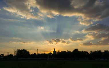 Siluet Buda, günbatımı arka plan