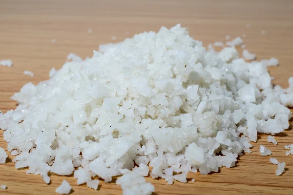 Sea salt on a wooden floor — Stock Photo, Image