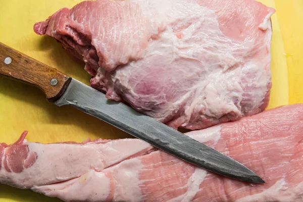 Fresh raw pork  and knife — Stock Photo, Image
