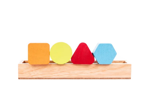 Geometría de madera de colores sobre fondo blanco — Foto de Stock