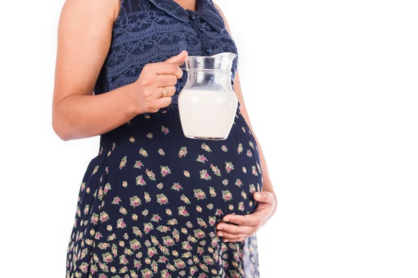 ミルク入りの妊娠中の女性 — ストック写真