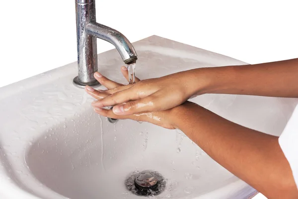 Азіатська дівчина миє руку — стокове фото