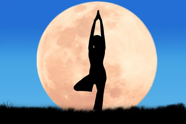 Silhouette young woman practicing yoga on full moon background — Stock Photo, Image