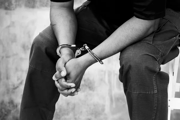 Black and white of the man was bound by hand in the handcuffed o — Stock Photo, Image