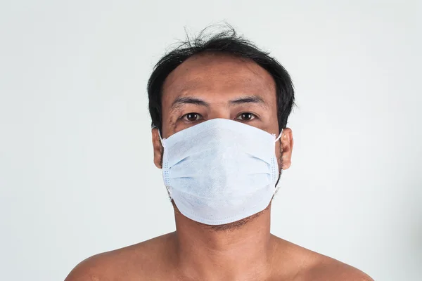 Hombre con máscara sobre fondo blanco —  Fotos de Stock