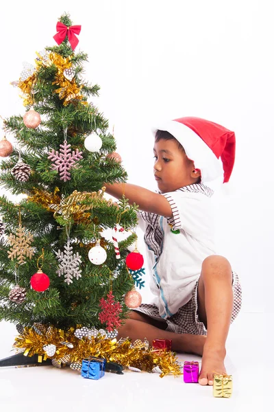 Niedlichen Jungen spielen Weihnachtskollektion — Stockfoto