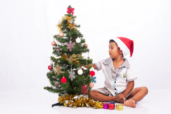 cute boy play christmas tree collection