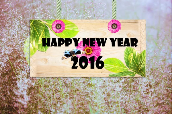 Happy new year  signpost in beautiful meadow — Stock Photo, Image