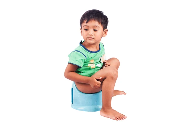 Cute little boy constipation isolate background — Stock Image Cute little boy constipation isolate background Royalty Free Stock Photos