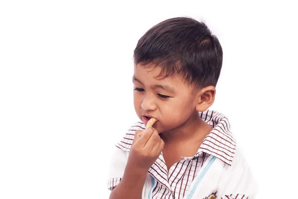Küçük çocuk snack yemek yeme — Stok fotoğraf