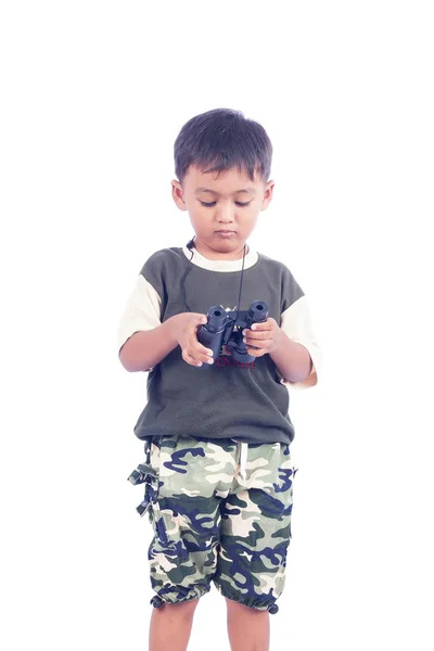 Malý chlapec hrát binokulární — Stock fotografie
