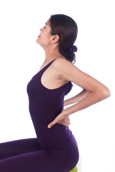 Mulheres jovens dor nas costas — Fotografia de Stock