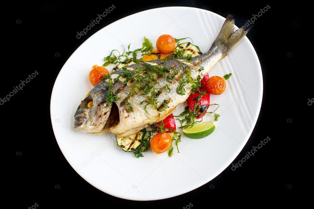 grilled gilt head bream fish with vegetables
