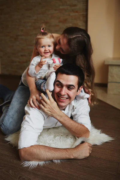 Beautiful family of three people, mom dad and daughter — Stock Photo, Image