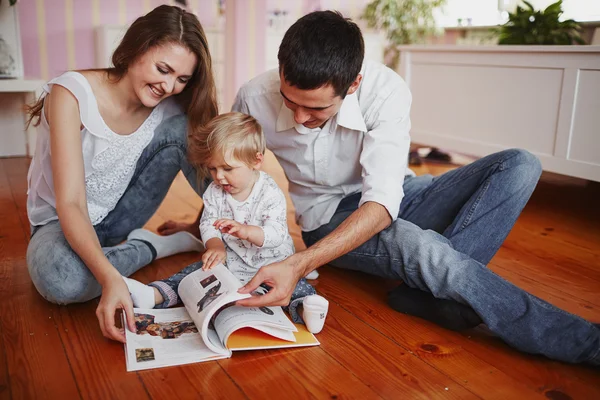 Beautiful family of three people, mom dad and daughter — Stock Photo, Image
