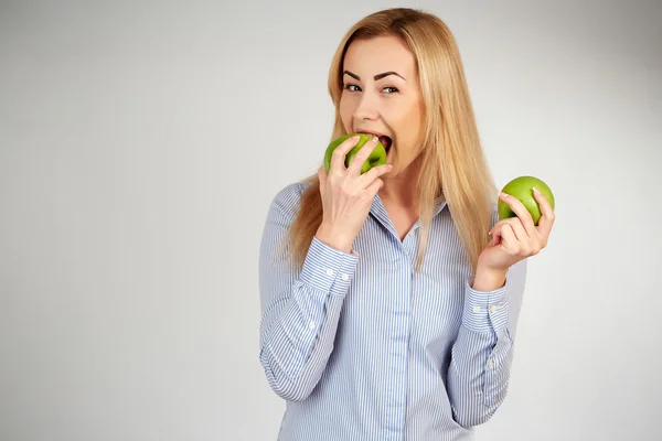 Healthy girl in diferent emotions, with green apple