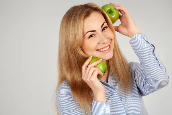 Healthy girl in diferent emotions, with green apple Stock Picture