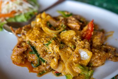 Stir Fried Crab with Curry Powder served on Plate