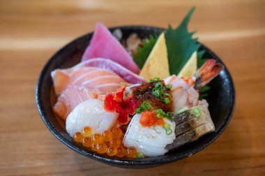 Kaisen Don, a Japanese rice bowl dish of seafood. Including raw fish such as Hotate, Salmon, Saba, Engawa, Ikura.
