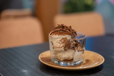 Square Tiramisu served in a cup in the cafe