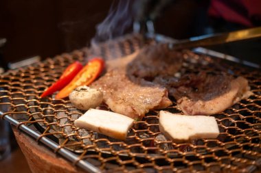 Marinated pork collar on the grill, Korean Style