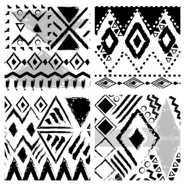 Conjunto de cuatro patrones inconsútiles tribales dibujados a mano en blanco y negro — Vector de stock