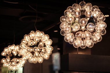 Hanging chandeliers made of light bulbs