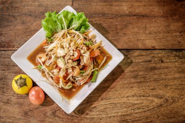 Somtum, papaya salad with shrimp, spicy Thai food dish clipart
