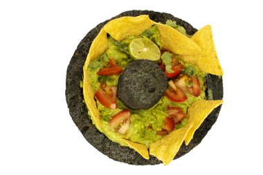 Üst manzara avokado sosu limon, sarımsak, kişniş, domates...