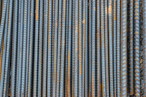 Barres d'armature rouillées utilisées dans la construction texture de fond — Photo