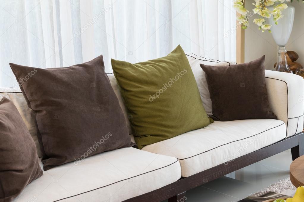 Modern living room design with sofa and pillows Stock Photo by