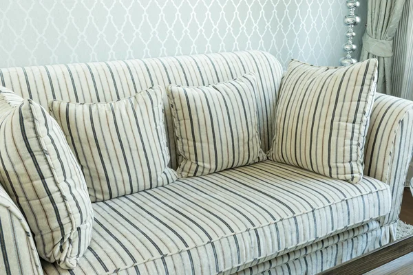 Elegant living room interior with striped pattern pillows on sofa — Stock Photo, Image