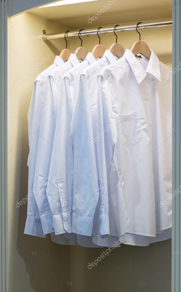Photo by Susanne Alfredsson, - All white clothes in a closet
