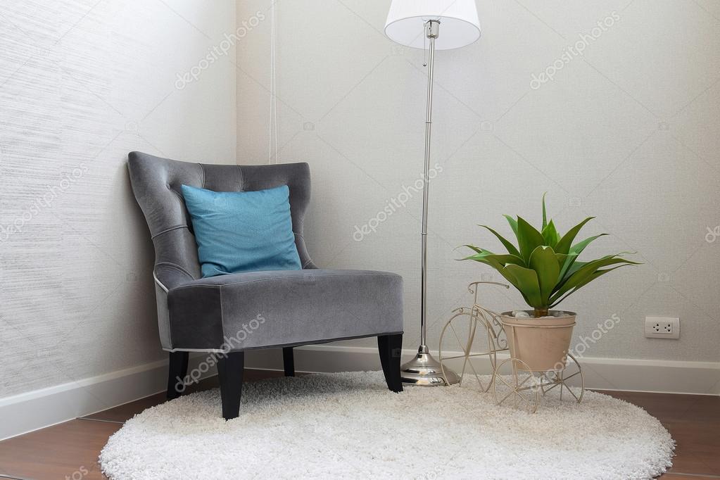 Luxury Grey Tweed Sofa With Blue Pillow In Living Room