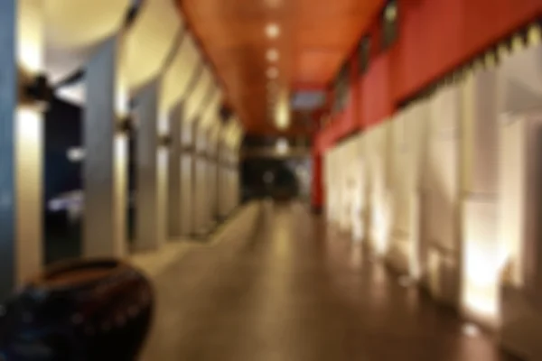 Blur image of corridor or building hallway at night for background — Stock Photo, Image