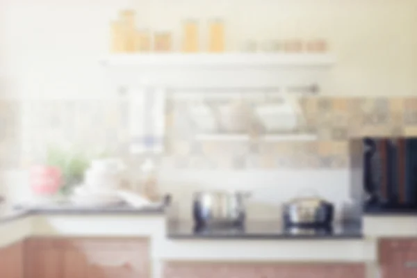 blurred image of modern kitchen interior for background