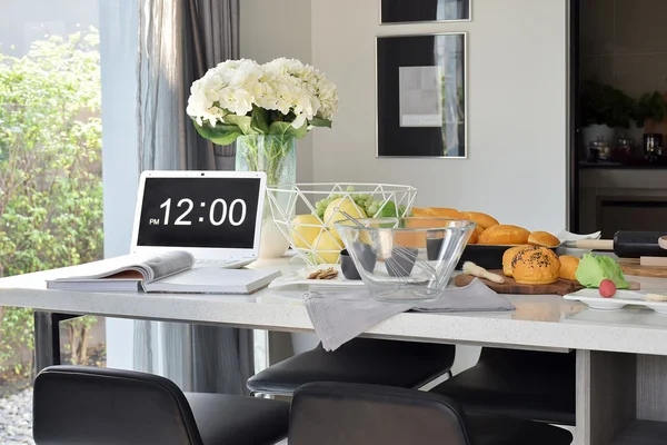 Pastry on the white artificial stone top dining table in the modern dining room — Stock Photo, Image