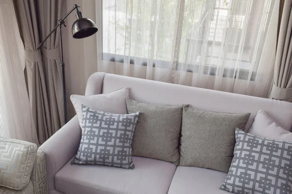 Pattern and texture pillows on beige sofa in the living room — Stock Photo, Image