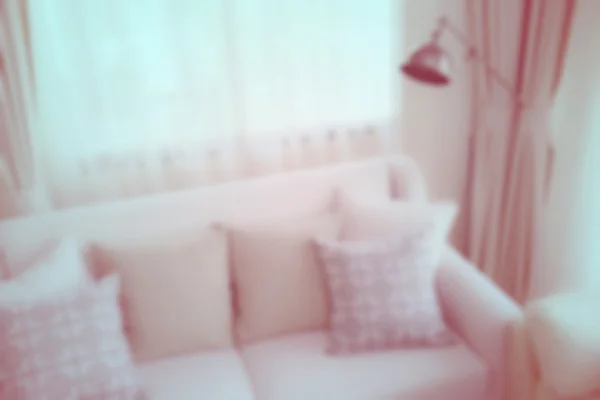 Vintage styl fotografie s rozostření obrazu vzoru polštáře na pohovce v obývacím pokoji — Stock fotografie