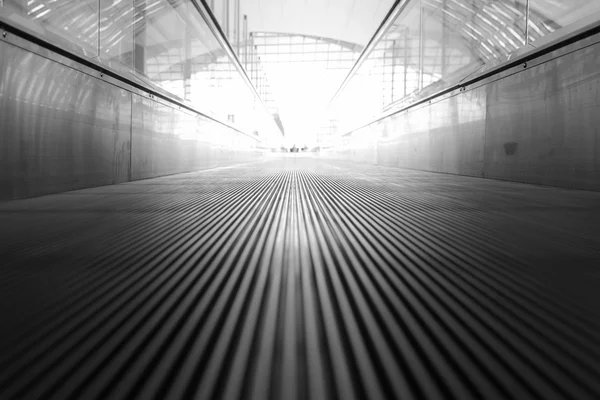 Moving walkway and light on background. — Stock Photo, Image