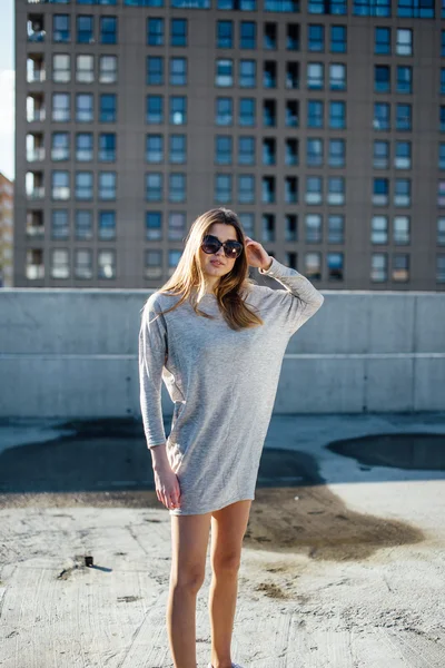 Young pretty girl model posing on the parking — Stock Photo, Image