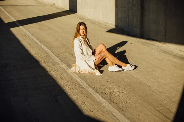 Young pretty girl model posing on the parking — Stock Photo, Image