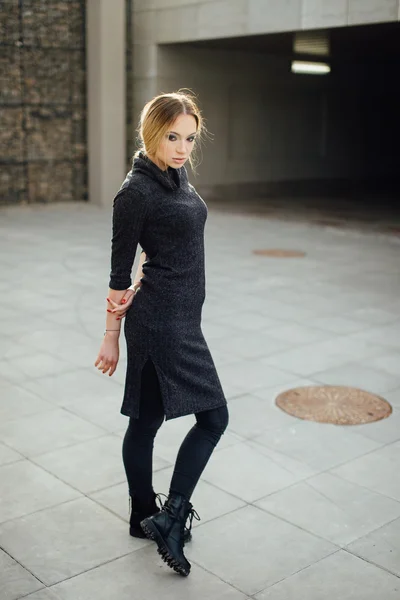 Young woman standing on the street