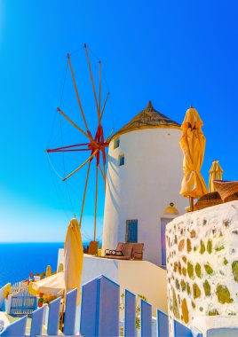 Old traditional windmill in Greece clipart